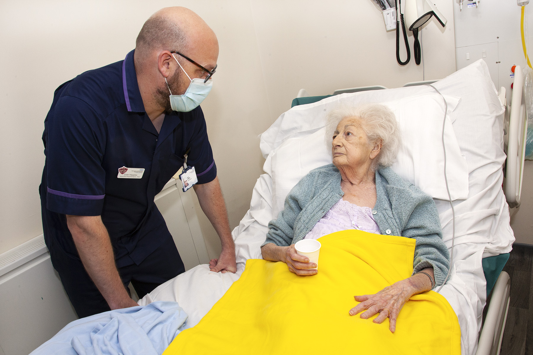 Yellow socks and blankets rolled out for patients at risk of falling